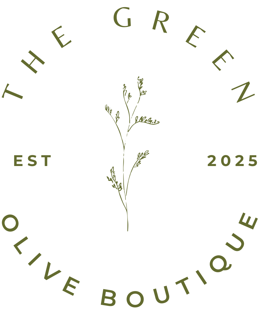 Logo for The Green Olive Boutique with a branch design on a white background